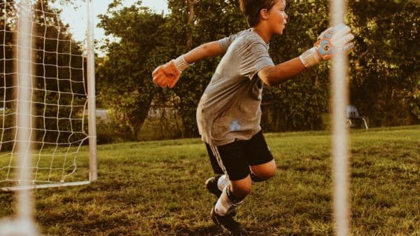 boy playing soccer